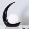 Creative moon resin personalized bedroom bedside lamp, modern and simple living room decoration, study desk lamp, one-piece consignment Application Scenario